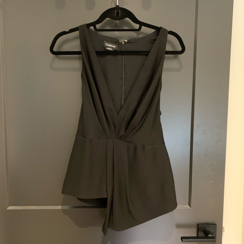 BEBE black deep-v going out top. Size 6.